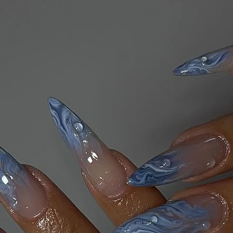 The Nail Connection on Instagram: "Ocean waves 🌊🩵  📸: @purpleempessence   Follow @thenailconnection for more nail inspo 💅🏽✨  #nails #nailartinspo #marblenails #bluenails #gelnails #nailinspo #naildesigninspo #cutenails #creativenails #trendingnails #springnails #nailtrends #nailartist #almondnails #nailartideas #nailideas #thenailconnection #thenailconnectionxo" Mermaid Nails Acrylic, Almond Nail Designs Trending Now, Marble Almond Nails, Long Blue Nails, Jojo Nails, Wave Nails, Blue Coffin Nails, Ring Finger Nails, May Nails