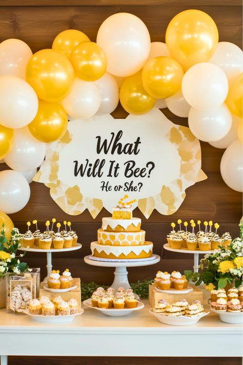 How do you keep guests buzzing with excitement at your baby shower? The "What Will It Bee?" theme combines lively decor with an interactive gender reveal moment using a cake filled with hidden frosting colors. It’s fun, vibrant, and perfect for twins. Let this buzzing theme inspire your celebration! Honey Bee Gender Reveal Cake, Bumble Bee Baby Shower Ideas Decoration, Baby Shower Ideas Bee Theme, Momma To Bee Baby Shower Ideas, Baby Bee Shower Ideas, What Will It Bee Gender Reveal Decor, Gender Neutral Baby Shower Ideas Summer, Gender Reveal Ideas Bee Theme, Baby Shower Bee Theme Decorations