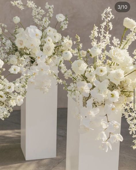 White Floral Aisle Arrangements, Tall Table Arrangements Wedding, Ceremony Flowers On Pedestals, Wedding Flower Arrangements Altar, Ceremony Pedestal Arrangements, Clear Plinths With Flowers, Plinths With Flowers, Alter Flower Arrangement, Wedding Pillars Ceremony