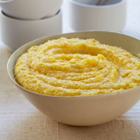 Creamy Cheese Grits Recipe - Marcia Kiesel | Food & Wine Grits Cheese, Crockpot Grits, Cooked Cheese, Creamy Cheese Grits, Cheese Grits Recipe, Cheesy Grits, Crockpot Ideas, Grits Recipe, Quick Side Dishes