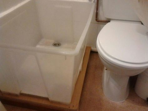 I hope I never have a bathroom this small, but in case I ever do I want to remember this. Cheap Shower Floor Ideas, Temporary Shower Ideas, Camper Bathtub, Rv Tub, Ikea Samla, Diy Tub, Camper Bathroom, Plastic Bin, Rv Bathroom