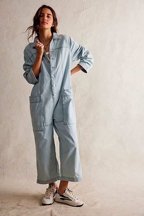 Forever cool and utility-inspired, this jumpsuit from our We The Free collection is the perfect throw-on-and-go staple. **Fit:** Shapeless, wide-leg fit **Features:** Front button-up closures, classic collared neckline, side pouch pockets, rigid denim **Why We ❤ It:** Toughened-up with moto boots or off-duty with sleek ballet flats, this style has endless ways to wear. | We The Free Margarita Jumpsuit at Free People in Light Wash, Size: XS Pink Sale, Jumpsuit Fashion, Denim Jumpsuit, Moto Boots, Off Duty, Denim Fashion, Boho Outfits, Pocket Pouch, Ballet Flats