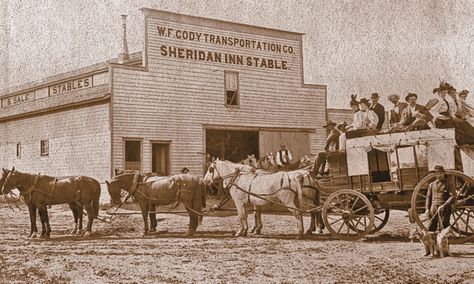 This historical photo of William “Buffalo Bill” Cody’s stagecoach line to the Black Hills in Dakota Territory shows his livery stable, originally built in 1894, which was also used by the Sheridan Inn. What Were Frontier Livery Stables Like: https://truewestmagazine.com/article/what-were-frontier-livery-stables-like/ Livery Stable, Ranches Living, Pioneer Day, American Frontier, Buffalo Bill, Black Hills, American West, Us History, Old West