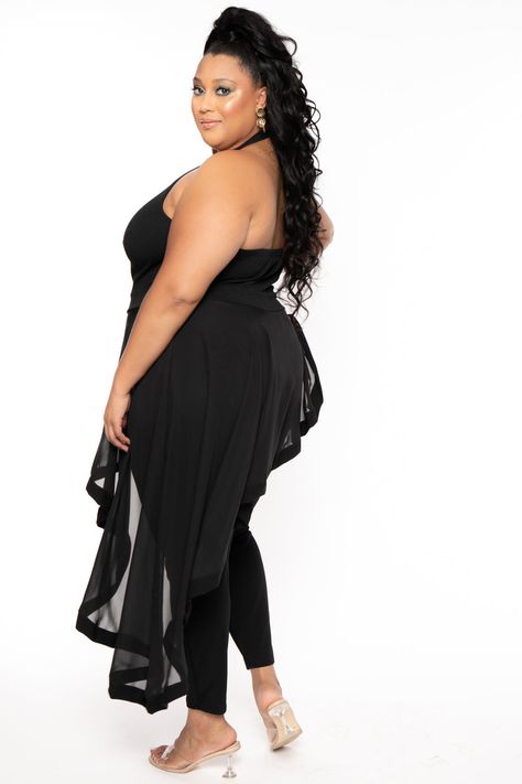 This plus size, sleeveless jumpsuit features a halter mock neck, dome button closure, a asymmetrical chiffon overlay Made in USA Content + Care Self: 95% Polyester 5% Spandex Contrast: 100% Polyester Machine wash cold, turn garment inside out Model Measurement Wearing a Size 2X Height: 5'11" Bust: 42" Waist: 35" Hip: 50" Inseam: 31" Star Jumpsuit, Lace Top Jumpsuit, Jumpsuit Plus Size, Lace Top Dress, Affordable Plus Size Clothing, Shimmer Dress, Sequin Jumpsuit, Lace Jumpsuit, Plus Size Models