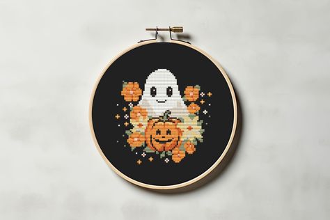 Get into the Halloween spirit with our Flower Ghost Cross Stitch Pattern PDF! This cute and funny design is perfect for adding a touch of spooky charm to your fall decor. With its easy and small size, it's a breeze to stitch up in no time. Whether you're a seasoned stitcher or just starting out, this pattern is sure to bring some autumn magic to your crafting projects. Get ready to embrace the pumpkin, jack-o-lantern vibes with our adorable Flower Ghost pattern! Flower ghost cross stitch pattern Ghost Cross Stitch, Cross Stitch Halloween, Flower Ghost, Pumpkin Cross Stitch Patterns, Halloween Cross Stitch Charts, Lion Craft, Pumpkin Cross Stitch, Pumpkin Jack O Lantern, Cross Stitch Beginner