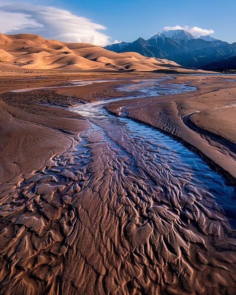 Visit Colorado on Instagram: “The Great Sand Dunes National Park has the tallest sand dunes in North America. This photo was taken earlier in the year when the seasonal…” Sand Dunes Colorado, Sand Dunes National Park Colorado, Great Sand Dunes National Park, Great Sand Dunes, American National Parks, Colorado Photography, Sand Dunes National Park, Visit Colorado, National Parks Photography