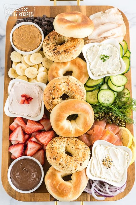 This Brunch Charcuterie Board is packed with bagels, creamy spreads, and a wide variety of sweet and savory toppings to enjoy. #brunchboard #brunchcharcuterieboard #charcuterieboard #brunch #breakfast Breakfast Ideas Bagels, Bagel Breakfast Board, Bagel Toppings Ideas, Get Together Ideas, Brunch Charcuterie Board, Brunch Charcuterie, Breakfast Diner, Simple Brunch, Bagel Breakfast