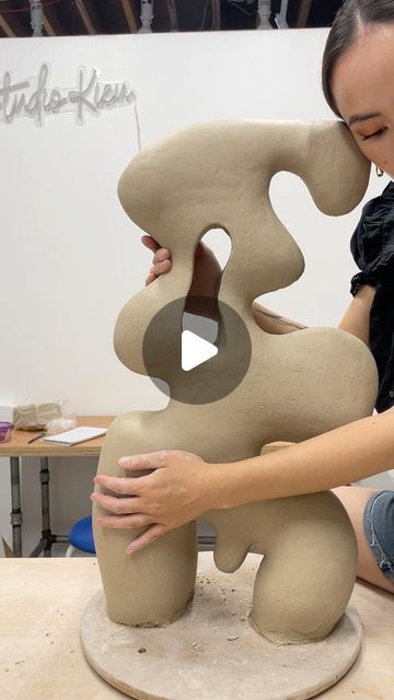 Kieu Tran on Instagram: "In case you were worried, the work is always embraced and loved before it leaves the studio. ☺️💞  Here are some glimpses into my studio practice. I use a groggy mid-fire stoneware clay. I use traditional coil, slab and pinch techniques to make my hollow ceramic sculptures. These are techniques that have been used for thousands of years. Coil building is an ancient ceramic process of rolling out “snakes” of clay, placing them in the desired shape, and smoothing them together. I blend my hand rolled coils together using my fingers with a hand inside to support the walls. I then use a variety of metal and rubber ribs to blend and smooth my pieces to the desired result. ✨" Ceramic Coil Sculpture, Clay Coil Sculpture, Coil Built Ceramics, Coil Building Ceramics, Coiled Ceramics, Coil Sculpture, Art Igcse, Earth Bending, Coil Pots