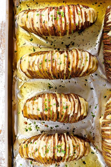 Hasselback Potatoes with Garlic Herb Butter and Gouda! Hassle Back Potatoes, Hasselback Baked Potato, Hasselback Potatoes, Garlic Herb Butter, Carlsbad Cravings, Potato Recipes Side Dishes, Garlic Herb, Roasted Broccoli, Sliced Potatoes