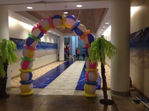 Tropical or beach party decor – beach balls and swim rings arch Beach Ball Arch, Ball Arch, Boardwalk Theme, Arch Entrance, Margaritaville Party, Beach Ball Party, Rally Idea, Prom Planning, Post Prom