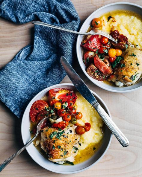 Baked Chicken with Tomatoes and Garlic | Brooklyn Supper Baked Chicken With Tomatoes, Skillet Baked Chicken, Garlic Greens, Chicken With Tomatoes, Crusted Chicken Tenders, Delicious Chicken Dinners, Creamy Polenta, Crusted Chicken, Baked Chicken Recipes