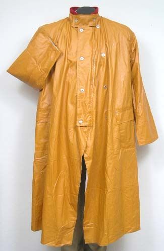 Pommel Rain Slicker Authentically reproduced to replicate the old time “Fish Brand” slickers.  The slicker is very light weight and has a water resistant finish using modern day materials.  It has a cotton muslin lining and a traditional red wool collar with storm closure.  #PommelRainSlicker #Fisherman #CowboyGear Candy Mountain, Rain Slicker, 1950s Mens, Cowboy Gear, Wind And Rain, Cotton Muslin, Red Wool, Muslin Cotton, Wild West