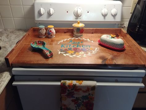 Extra counter space. Simple tray with side handles and a hand painted medalian in the middle Diy Noodle Board, Farmhouse Stove, Diy Noodles, Gas Stove Top Covers, Kitchen Boards, Stove Covers, Wooden Stove Top Covers, Wooden Stove, Stovetop Cover