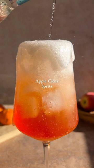 Julianna McIntosh on Instagram: "When life gives you homemade apple cider, you make an apple cider spritz Perfect to serve as a welcome cocktail for your guests this Thanksgiving! Here’s how to make it: In a glass filled with ice add 3 oz Prosecco 1.5 oz Aperol 1 oz apple cider 1/2 oz cinnamon syrup 1 oz sparkling water, or tonic Stir to combine & garnish with a rosemary sprig Xoxo, cheers! #thanksgiving #thanksgivingrecipes #drinkrecipes #spritz #aperolspritz" Thanksgiving Spiked Drinks, Autumn Aperol Spritz, Spritz Cocktails, Welcome Cocktail, Sparkling Apple Cider, Aperol Spritz Recipe, Spiked Apple Cider, Apple Cocktail, Thanksgiving Dinner Party