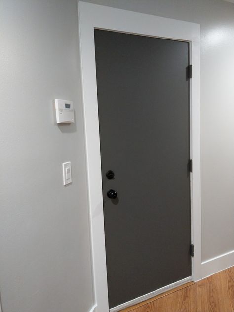 Black interior doors. Kendall Charcoal door, Repose Gray wall, white trim. #blackdoors #whitetrim #baseboards #moderbaseboards #simpledesign Gray Wall White Trim Black Door, Dark Gray Doors With White Trim, Gray Wall White Trim, Charcoal Interior Doors, Dark Grey Doors Interior, White Trim Gray Walls, Grey Doors White Trim, Dark Gray Interior Doors, Charcoal Doors