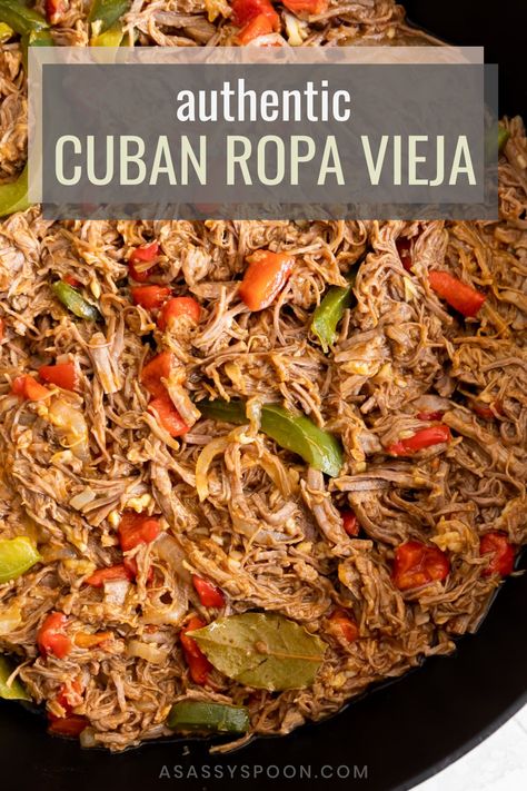 Cuban Ropa Vieja (shredded beef) in a black pan with the words "authentic cuban ropa vieja" in the foreground Cuban Ropa Vieja, Ropa Vieja Recipe, Shredded Beef Recipe, Shredded Beef Recipes, Pollo Recipe, Cuban Dishes, Cuban Cuisine, Savory Dinner, Homemade Tomato Sauce