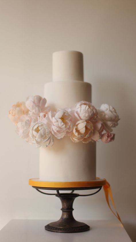 Hand crafted sugar peonies on a three tier luxury white fondant iced cake Luxury Wedding Cake Design, Large Wedding Cakes, Iced Cake, White Fondant, Large Bouquet, Ice Cake, Dream Wedding Cake, Luxury Wedding Cake, Wedding Cake Flavors