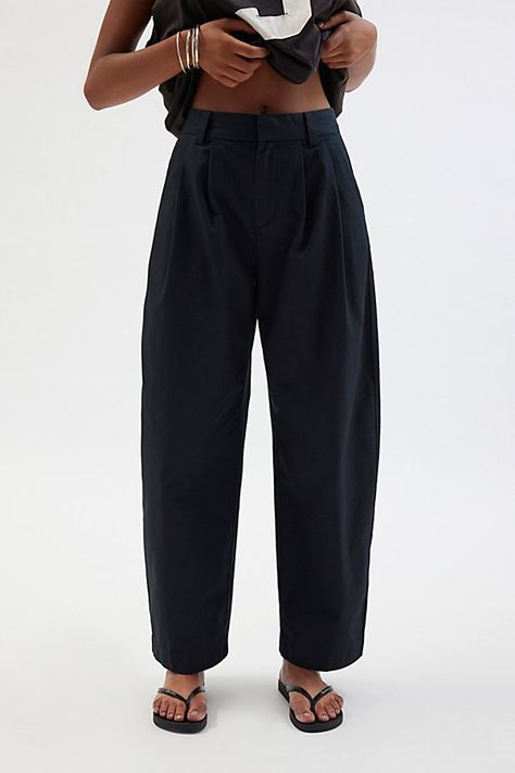 Forever cool BDG pant in a wide-leg silhouette. Featuring a low-rise, tailored pleated seams at the waist and trouser-style pockets & belt loops. Only at Urban Outfitters. Features BDG Kristen twill trouser Pleated wide leg pant Lightweight twill fabric Low-rise waist Pleated leg seams at the front Side-slant pockets Welt back pockets Relaxed wide-leg fit Ankle length Content + Care 100% Cotton Machine wash Imported Size + Fit Model in Neutral is 6' and wearing size Small Measurements taken from Best Pants For Curvy Women, Cool Trousers, Urban Outfitters Relaxed Fit Wide Leg Bottoms, Womens Trousers, Travel Clothes, Urban Outfitters High Waist Relaxed Fit Pants, Urban Outfitters Relaxed Fit Pants With Pockets, Cropped Trousers Outfit, Urban Outfitters Wide-leg Pants With Pockets