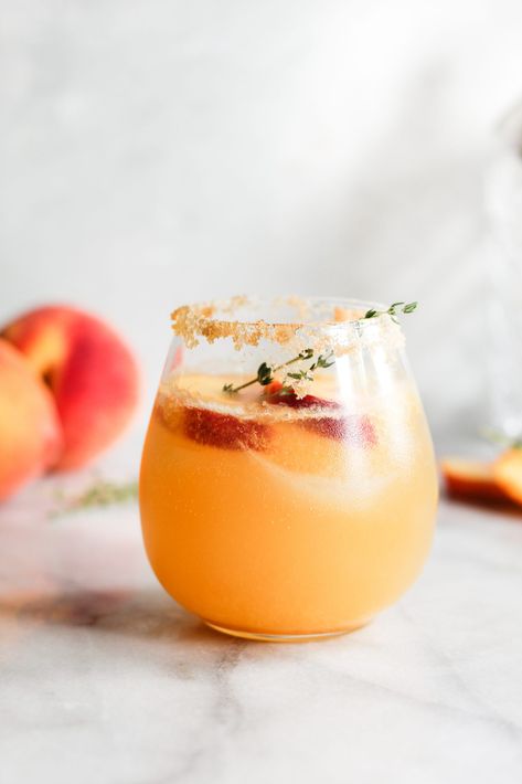 Peach Thyme Spritzer - Our Balanced Bowl Peach Cocktail Recipe, Infused Simple Syrup, Peach Rum, Vodka Cocktails Easy, Fruity Alcohol Drinks, Christmas Drinks Alcohol Recipes, Boozy Popsicles, Easy Alcoholic Drinks, Christmas Drinks Alcohol