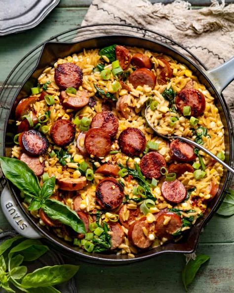 Creamy Cajun Orzo with Sausage (One Pan!) - Britney Breaks Bread Orzo Keilbasa, Andouille Sausage Orzo, Cajun Kielbasa Recipes, Chorizo Pork Sausage Recipes, Jalapeno Cheddar Sausage Meals, Cajun Orzo Recipes, Andouille Sausage Recipes Healthy, Orzo Sausage Recipes, Poolside Meals