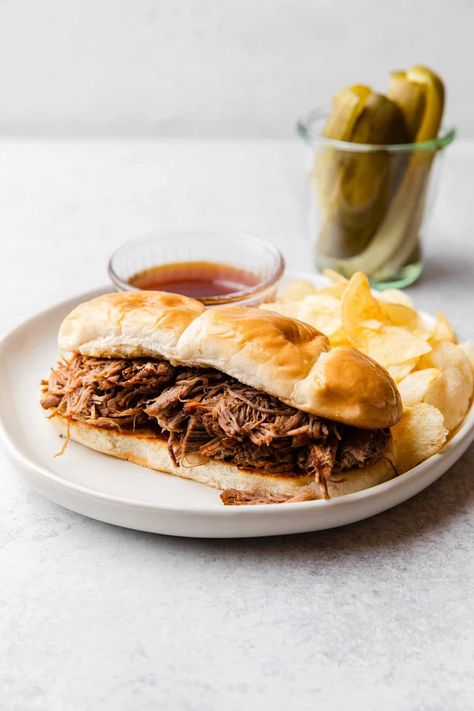 The best French dip sandwiches are made in the instant pot! This reicpe is easy to make from chuck roast. A filling meal for lunch or dinner with a beer infused au jus. Instant Pot French Dip Sandwiches, Instant Pot French Dip, French Dip Sandwiches, Beef Dip, Dip Sandwiches, Homemade Sandwich, French Dip Sandwich, Roast Beef Recipes, Beef Chuck Roast