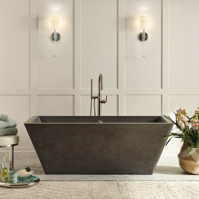 Native Trails Elevate your bathroom’s aesthetic with the Mendocino concrete bathtub. This freestanding tub radiates organic beauty; its clean lines make it a stunning focal point in modern farmhouse designs. The Mendocino’s thick walls provide insulation for long-lasting heat, while its slanted sides provide gentle support for enhanced comfort. An improved two-part sealer is proven to prevent staining, scratching, and cracking. Artisan crafted from a blend of concrete and natural jute fiber, the Walk In Shower Sizes, Cement Bathtub, Concrete Bathtub, Concrete Bath, Deep Tub, Farmhouse Designs, Shower Sizes, Standing Stone, Modern Farmhouse Design