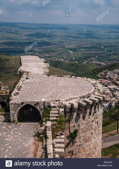 Krak des Chevaliers, formerly Crac de l'Ospital is a Crusader castle in Syria and one of the most important medieval castles in the world. Stock Photo Krak Des Chevaliers, Medieval Castles, Medieval Castle, Crusades, Syria, Castle, High Resolution, Stock Images, Resolution