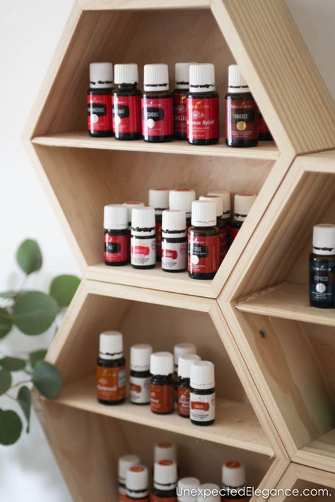 Quick and EASY DIY Essential Oil Wall Storage that is Pretty! Diy Essential Oil Display, Essential Oil Shelf Diy, Aromatherapy Jewelry Diy, Ladder Shelf Diy, Oil Display, Oil Shelf, Diy Shelf, All Natural Cleaners, Essential Oil Shelf