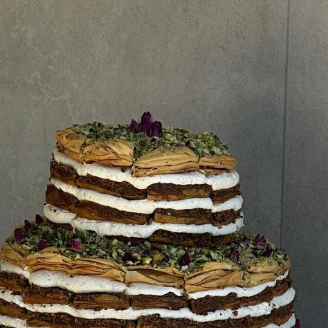 christiana on Instagram: "on sunday i had the honour of making this baklava wedding cake❣️ 

during the delivery ride, the back portion of the top two tiers slid off. it was a very sad moment for me. i used dowels for the first time and incorrectly, the weight of the cake needed more attention esp that it was feeding 100, the pre-cut pieces did not work for this size of cake. it needed to be kept whole and not pre-cut. there are many other factors that i have broken down, analysed and heavily pondered about. i’m still not mentally recovered. i felt like i failed. when i say the stress of a wedding cake is immense, i mean i thought about it every second of my life for a grand period 😞 

i am big on living and learning. anyone who knows me knows i am generally very hard on myself with every Baklava Wedding, True To Myself, I Failed, So Many Questions, Baklava, So Grateful, Who Knows, My Way, Wedding Cake