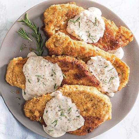 As temperatures fall, ’tis the season for homey, stick-to-your-ribs dinners like Chicken-Fried Pork Chops with White Gravy. Chicken Fried Pork Chops, Southern Dinners, Chicken Fried Pork, Rosemary Gravy, Recipe For Pork Chops, White Gravy Recipe, Fried Pork Chop Recipes, Gravy Chicken, Pork Chop Dishes