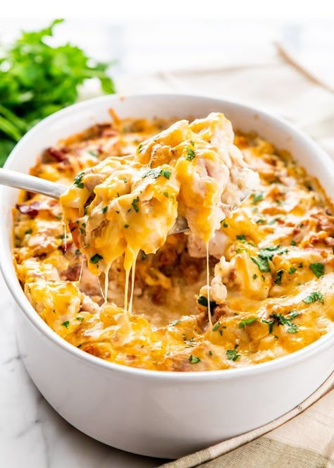 This Chicken Bacon Ranch Casserole is your answer to a busy weeknight dinner. We're talking creamy, cheesy rice casserole loaded with Ranch chicken and bacon! #casserole #chickenranchcasserole Slow Cooker Chicken Bacon Ranch, Chicken Bacon Casserole, Loaded Chicken And Potatoes, Bacon Ranch Casserole, Cheesy Chicken Casserole, Top Dinner Recipes, Ranch Casserole, Bacon Casserole, Dinner Casserole Recipes