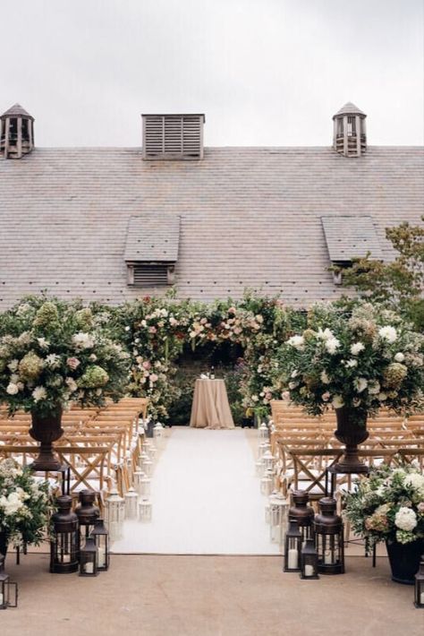 An after-dark wedding ceremony in autumn invites the intangible feeling of magic. Add walkways filled with glowing votives and outdoor ceremony spaces sprinkled with clusters of florals that lead to indoor dining areas embellished with walls of hydrangea, and you get a one-of-a-kind fall wedding. #caratsandcake 📷: Tec Petaja 📋: Soiree Telluride 💐: Stonekelly Events 📍: Blue Hill Farm Outdoor Wedding Altars, Farm Wedding Ceremony, Champagne Wedding Colors, Neutral Wedding Colors, Modern Wedding Venue, Virginia Wedding Venues, Luxury Wedding Decor, Outdoor Wedding Inspiration, Rustic Wedding Inspiration