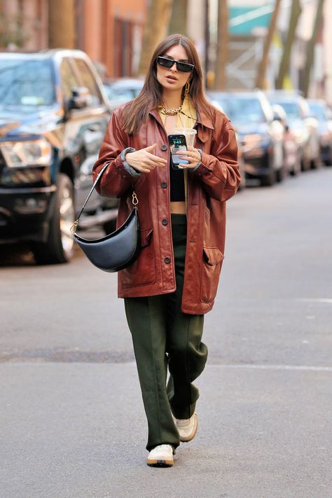 Emily Ratajkowski Styles Oversized Leather Jacket & Chunky Sneakers – Footwear News Trousers White Sneakers, Mustard Jacket, Luna Bag, Red Leather Coat, Oversized Leather Jacket, Emily Ratajkowski Style, Black Leather Coat, Pleated Trousers, Emily Ratajkowski