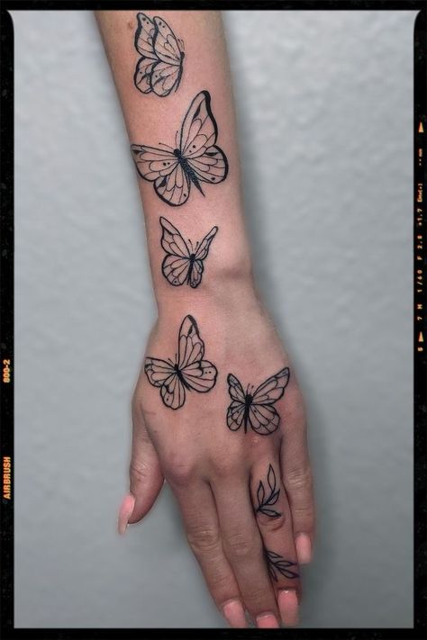 Butterfly Tattoo Hand And Arm, Butterfly Tattoo On Hand Going Up Arm, Tattoo Ideas Butterfly Project, Patch Work Butterfly Tattoo, Inside Forearm Tattoo Women Butterfly, Butterflies Going Up Arm Tattoo, Butterfly Trail Tattoo Arm, Multiple Butterfly Tattoo Arm, Butterfly Tattoo On Hand For Women