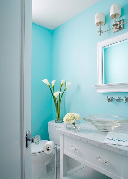 Delightful aqua powder room with walls of aqua blue as backdrop for nickel double sconces and white framed mirror with ledge. Bathroom Colors Blue, Blue Powder Rooms, Bathroom Colors Gray, Color Bathroom Design, Color Bathroom, Blue Vanity, Bathroom Paint Colors, Dekorasi Kamar Tidur, Powder Rooms