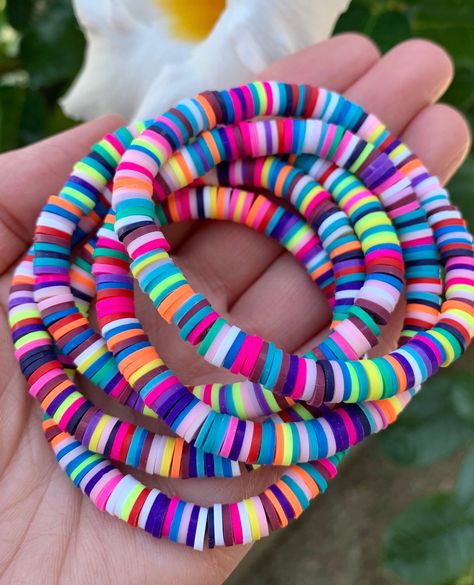 Excited to share this item from my #etsy shop: Rainbow Heishi Bracelet, Heishi Disc Beaded Stretch bracelet, Gift for Her, Stacking Bracelet, 6mm Vinyl disc bead, Beach Bracelet Rainbow Heishi Bracelet, Braclate Ideas, Heishi Jewelry, Sorority Party, Heishi Bracelets, Bracelet Beading, Vinyl Disc, Heishi Bracelet, Homemade Bracelets