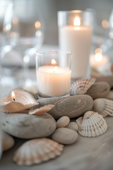 Create an enchanting tablescape that echoes the beauty of nature 🌿🌊. These eco-chic centerpieces blend earthly elements with the serenity of the sea, perfect for couples who love the environment. Ignite romance and sustainability on your special day! 🕯️❤️ #WeddingInspiration #EcoWedding #WeddingDecor #DIYWedding #SustainableLiving #SeasideTheme #NatureWedding #BohoChic Fisherman Wedding, Coastal Wedding Centerpieces, Chic Centerpieces, Seaside Theme, Eco Wedding, Eco Friendly Wedding, River Stones, Coastal Wedding, Eco Chic