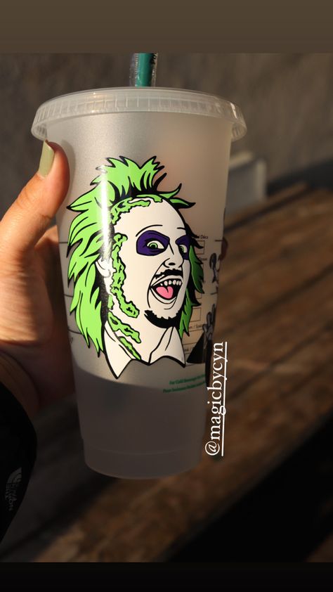 Custom beetlejuice Starbucks tumbler. Checkout @magicbycyn on IG Starbucks Tumbler, Cold Cup, Starbucks Cups, Beetlejuice, Custom Tumblers, Cricut Projects, Shot Glass, Cricut Design, Tumbler