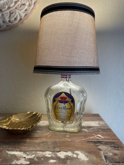 Awesome Crown Royal liquor lamp! Perfect for a gift or for your man cave! Crown Bottles, Whiskey Bottle Crafts, Old Liquor Bottles, Empty Liquor Bottles, Crown Royal Bottle, Alcohol Bottle Crafts, Liquor Bottle Lamp, Crown Bottle, Royal Wallpaper