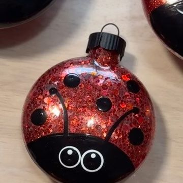 Lory Aucelluzzo on Instagram: "Ladybug Christmas ornament…. Let’s make a cute bug for your tree. She also makes the best gift! #handmadechristmas" Light Bulb Bugs Diy, Ladybug Ornaments Diy, Bumble Ornament, Bumble Bee Ornaments Diy, Glitter Light Bulb Ornaments Diy, Ladybug Christmas, Disney Diy Christmas Ornaments, Best Gif, Crochet Christmas Ornaments Free