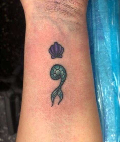 Disney Semicolon Tattoo, Ursula Shell Tattoo, Mermaid Semicolon, Ursula Tattoo, Mermaid Tail Tattoo, Sea Life Tattoos, Michigan Tattoos, Colon Tattoo, Semicolon Project