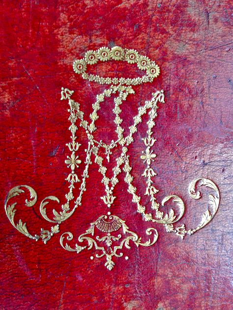 This cypher of Marie Antoinette adorns the cover of her extremely rare Prayer Book. This is a recent acquisition of moonsrarebooks.com Marie Antoinette Monogram, Marie Antoinette Versailles, Book House, Ivy House, French History, French Revolution, Prayer Book, Royal Jewels, Cover Book