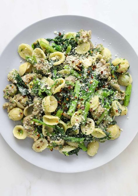 Orecchiette with broccoli rabe and sausage is one of my go-to dinners and I have a feeling it might become one of yours too! My favorite thing about orecchiette is it's cup shape makes it the perfect vessel to carry bits of crispy sausage, garlicky broccoli rabe and salty parmesan cheese. It's heavenly! The best part is this weeknight wonder comes together fast and only requires 6-simple ingredients! Broccoli Rabe And Sausage, Broccoli Raab, Sprouting Broccoli, Quick Easy Vegan, Broccoli Rabe, Herb Salad, Vegetable Pasta, Tag Friends, Kidney Health