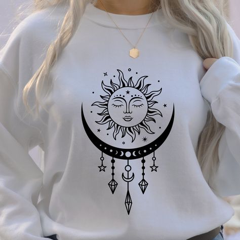 "Sun Moon Sweatshirt Sun Moon T Shirt Mystical Shirt Crystals Shirt Witchy Sweatshirt Astrology Sweater Hoodie Moon Lover Gifts Fall in love with this soft and cozy Boho Sun Moon Cycle Graphic Tee, Sweatshirt or hoodie PLEASE READ ENTIRE DESCRIPTION BEFORE PURCHASING TO MAKE YOUR SHOPPING EXPERIENCE EASIER, YOU CAN \"CHOOSE\" A T SHIRT, SWEATSHIRT OR HOODIE IN THIS LISTING. Available in Shirt, Sweatshirt and Hoodie Tee Shirt Shirt Sleeve Crewneck 100% Cotton Sweatshirt and Hoodies Long Sleeve So Moon Sweatshirt, Boho Style Design, Moon Lover, Hoodie Diy, Moon Cycle, Boho Moon, Cozy Boho, Moon T Shirt, Boho Sun