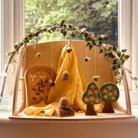 Kelly on Instagram: "Hello June 🐝 ☀️ Surprise surprise it’s grey cloudy and more like a cold March day here in North West England, but at least it’s sunny inside with a bright yellow seasonal table with a hand dyed play-silk and alder cone bees, all crafts from my Waldorf Magic guide to Bees 🐝 (in my store click on the link in my bio) I honestly love bees so I cannot wait to really get stuck into this months theme with the little one. I’ve had a few questions about Waldorf Magic this month, i Waldorf Playroom, Waldorf Preschool, Waldorf Kindergarten, Hello June, All Crafts, Waldorf Crafts, Surprise Surprise, West England, Autumn Table