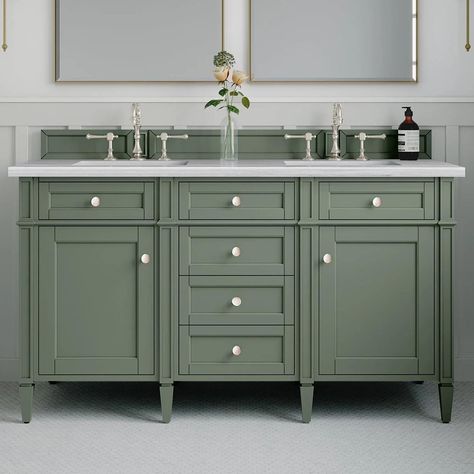 The James Martin 60" Brittany Double Vanity in Smokey Celadon 650-V60D-SC0, with decorative wood backsplash, features optimal organization with two hide-away tip-out drawers plus four center drawers. This cabinet also has two doors, each concealing an interior shelf. All drawers are lined with an aluminum laminate surface for easy cleaning and are equipped with undermount soft-close slides. | James Martin Brittany 60" Double Bathroom Vanity in Smokey Celadon | Nebraska Furniture Mart Olive Vanity Bathroom, Small Double Vanity Bathroom, Green Bathroom Vanities, Green Bathroom Cabinets, Green Double Vanity, Sage Green Bathroom Vanity, Green Vanity Bathroom, Lining Cabinets, Sauna Build