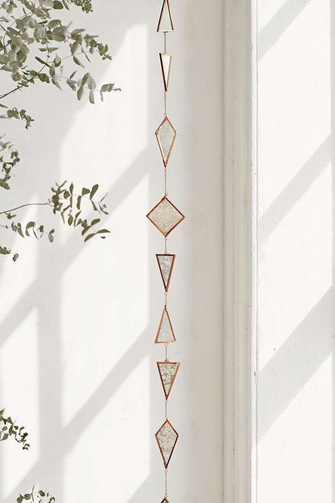 $29 Selma Hanging Garland. Hanging garland made from iron + glass. Glass geo shapes strung along a metal chain with 2 rings for easy hanging anywhere. Funky Home Decor, Hanging Garland, Stained Glass Diy, Stained Glass Crafts, Stained Glass Designs, Stained Glass Projects, Stained Glass Patterns, Stained Glass Art, Glass Crafts