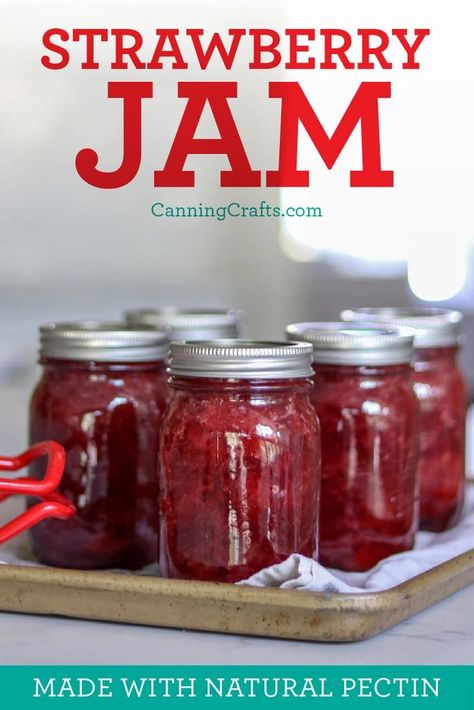 Our Strawberry Jam Canning Recipe is made with natural pectin using apples instead of store bought pectin. The amount of sugar is also reduced some compared to traditional strawberry jam recipes. | Get the recipe on CanningCrafts.com | #canning #strawberryjam #naturalpectin #pectinfree #jamrecipe #strawberryrecipe #foodpreservation #preserving #homecanning #canningrecipes #recipe #canningcrafts #masonjarlabels #masonjargifts