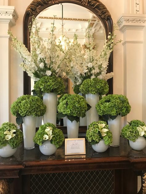 Hotel Lobby Centerpiece Floral Design, Hotel Lobby Flower Design, Lobby Flower Arrangement Hotel, Wine Table Decor, Large Green Floral Arrangement, Green Floral Installation, White And Green Flowers, Luxury Flower Arrangement, Hotel Flower Arrangements