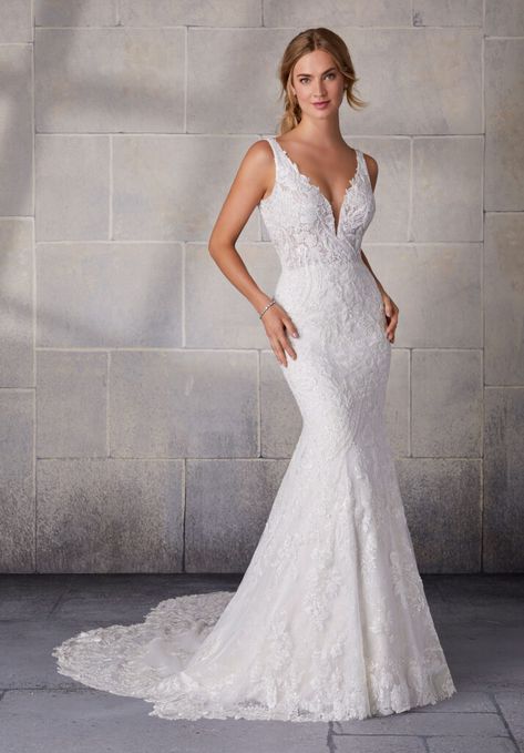 Accented with delicately beaded, frosted embroidery on net over sequined chantilly lace, our Stefani wedding dress features a figure flattering fit to flare silhouette. Sheer insets and beaded back details perfectly complement the scalloped hemline and sheer petal train. Available in three lengths: 55", 58", 61". Available with front bodice lining as style 2123L. Shown in Ivory. Beach Bridal Gown, Pregnant Wedding Dress, Essense Of Australia, Ruffle Wedding Dress, Applique Wedding Dress, Exclusive Wedding, A Wedding Dress, Princess Wedding Dresses, Lace Mermaid Wedding Dress